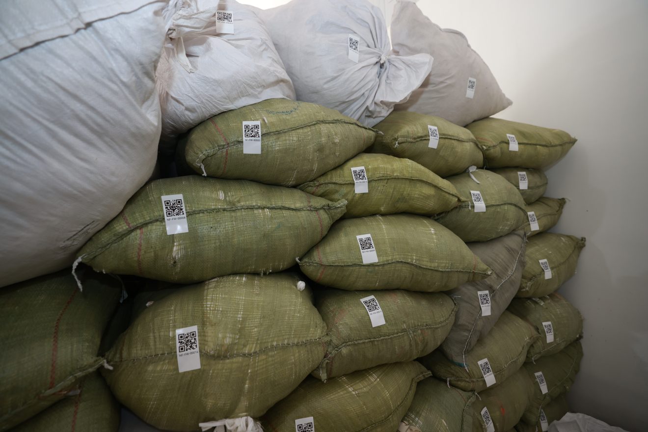 Recycled textile material bags stored before traceability marking